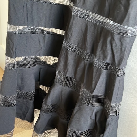 Long, chic black Tadashi Shoji gown with mesh-like panels and ribbed midsection - Picture 9 of 12